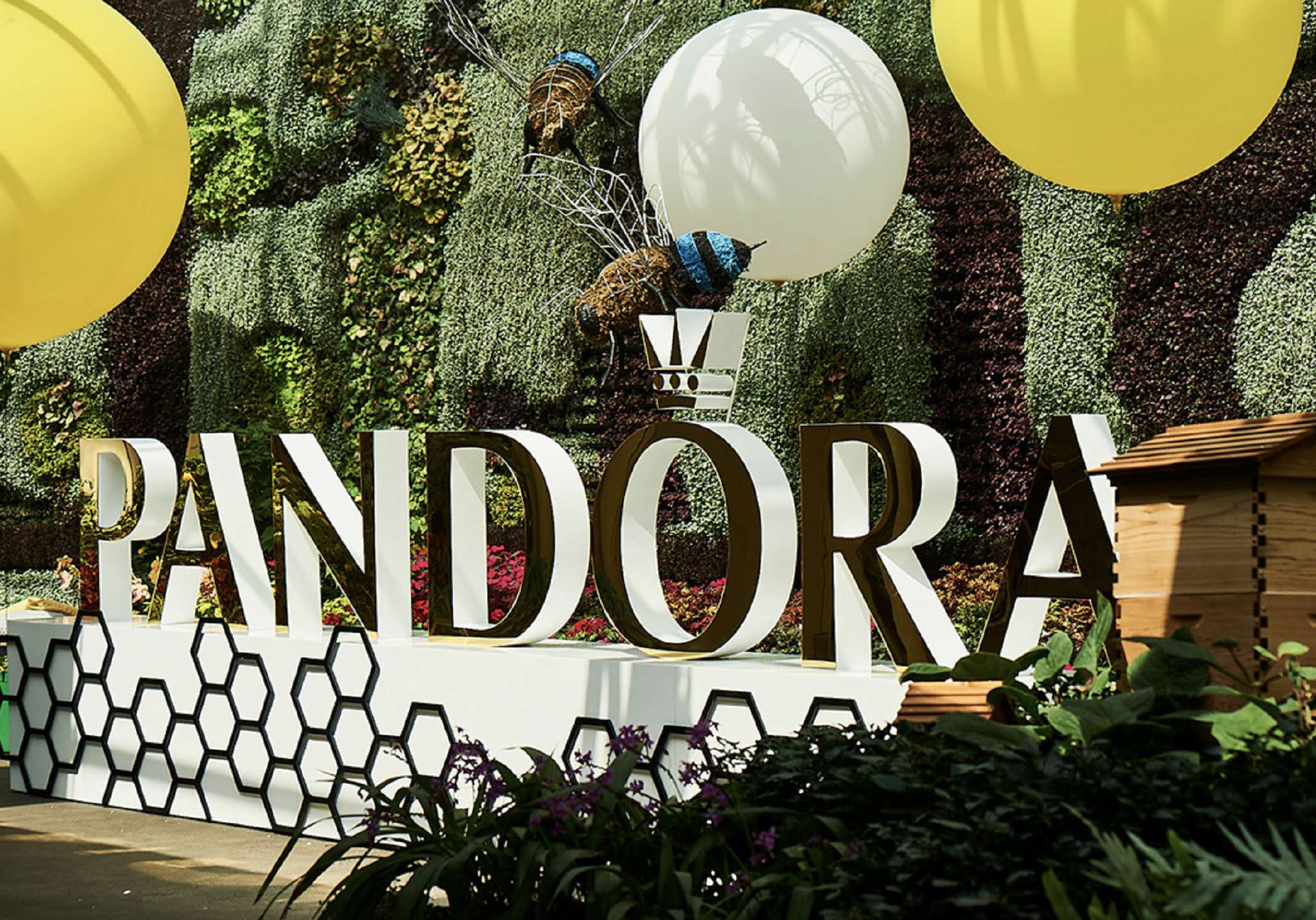 Oversized 3D Pandora sign on the living wall